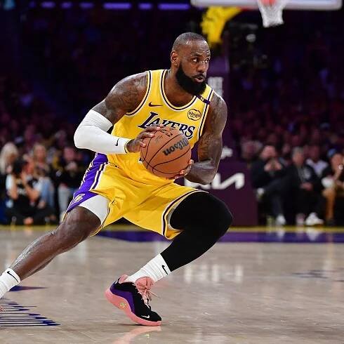 LeBron James picks up $52.6M option to remain with Lakers