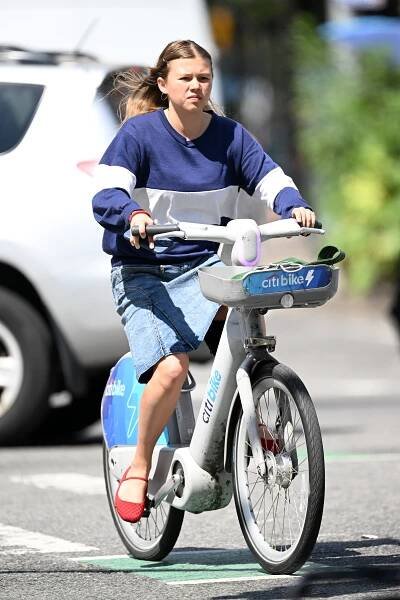 Matilda Ledger riding a Citi Bike in New York City.