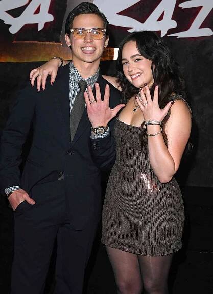 Cobra Kai's Tanner Buchanan and Mary Mouser Confirm Romance with a Kiss and Mystery Matching Rings on That Finger