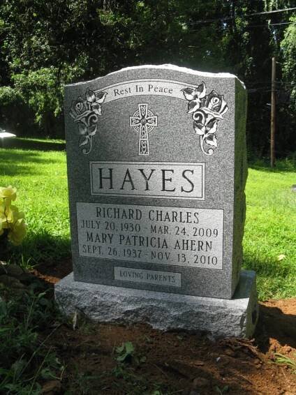 A grave marker for richard charles hayes and mary patricia ahern.