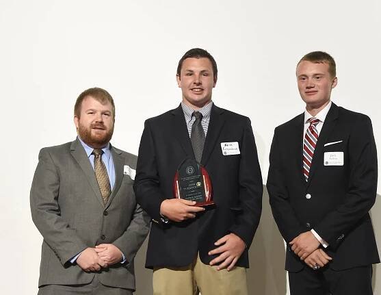 Josh Turanchick (center) took home the Patrick Mackey Courage Award due to his football success at Oak Hill High School while battling club feet. Jack Folkers (right) was a recipient of the award in 2014 and a scholar-athlete finalist at the 2016 Honors D