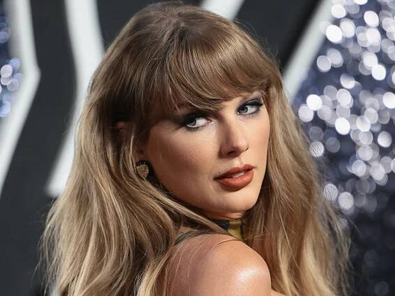 Taylor Swift Wore Those Glitter Freckles You've Been Seeing All Over TikTok—See the Photos