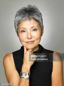 mature woman wearing black top, portrait - japanese mature women stock pictures, royalty-free photos & images