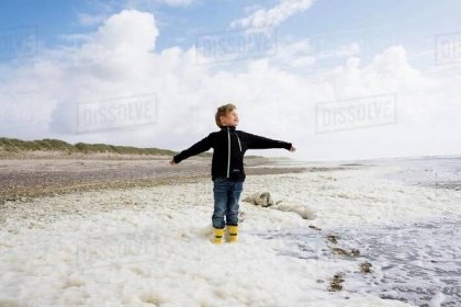 Boy on Beach - Stock Photo - Dissolve