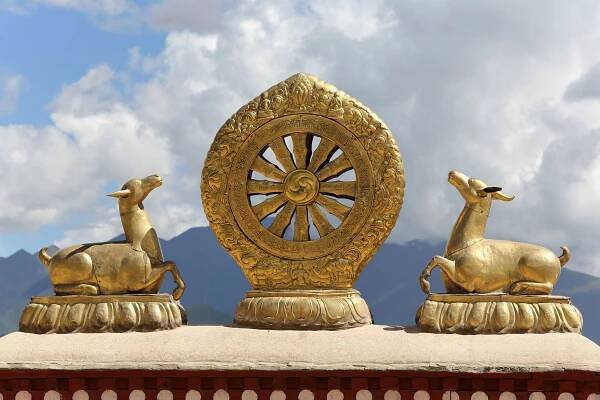 What the Dharmachakra (or Dharma Wheel) Represents to Buddhists