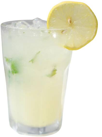 A glass of lemonade with ice and a slice of lemon on top.