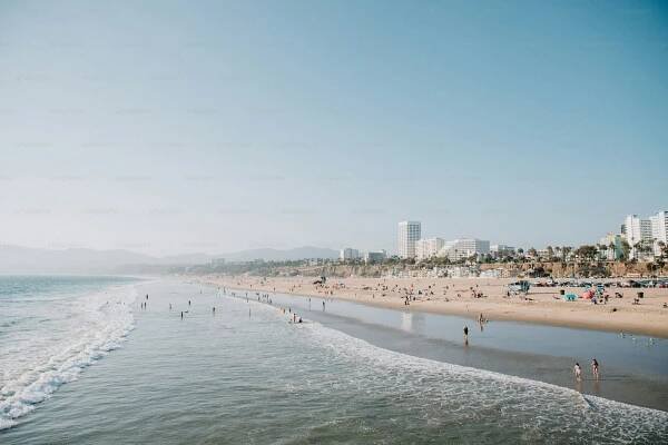The people relaxing on Santa Monica State Beach in California, USA