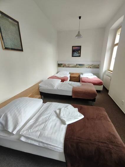 Posteľ alebo postele v izbe v ubytovaní Hotel Stará Škola