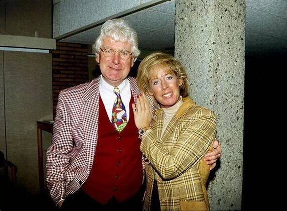 Gerard Cox smiles as Joke Bruijs smile for a photo
