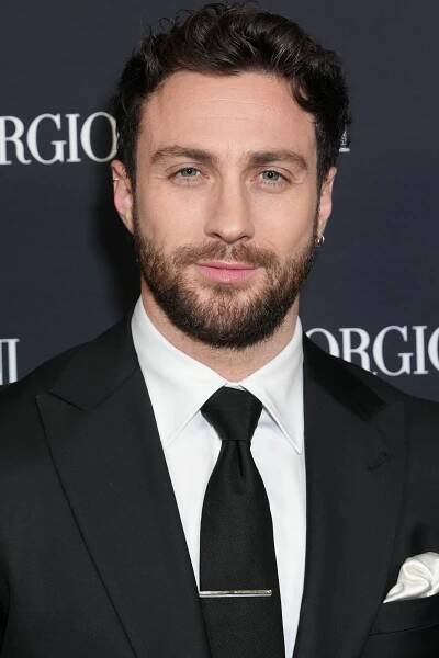 A very jacked Aaron Taylor-Johnson knows how to fill out a suit