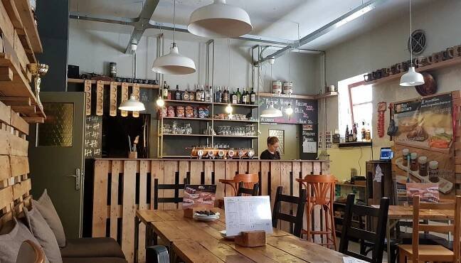 Interior of the bar, made mostly from old wooden pallets.