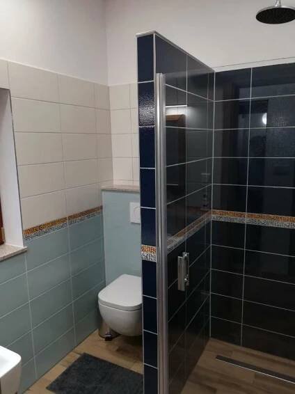 Koupelna v ubytování Apartmány U Holubů
