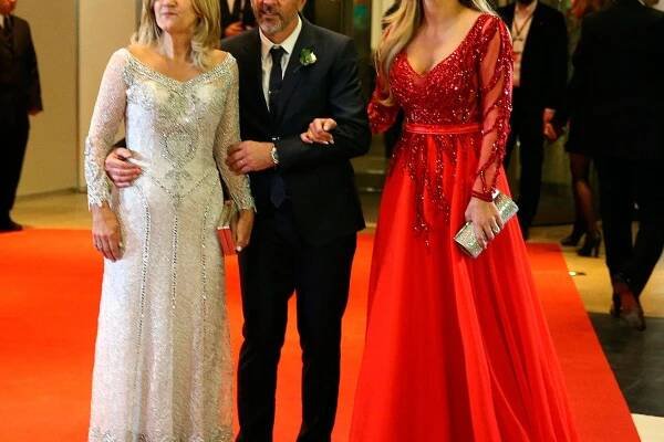 Argentine soccer player Lionel Messi's parents Jorge and Celia and his sister Maria Sol pose at his wedding to Antonela Roccuzzo in Rosario, Argentina, June 30, 2017. REUTERS/Marcos Brindicci