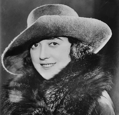 Mabel Normand portrait in coat and hat