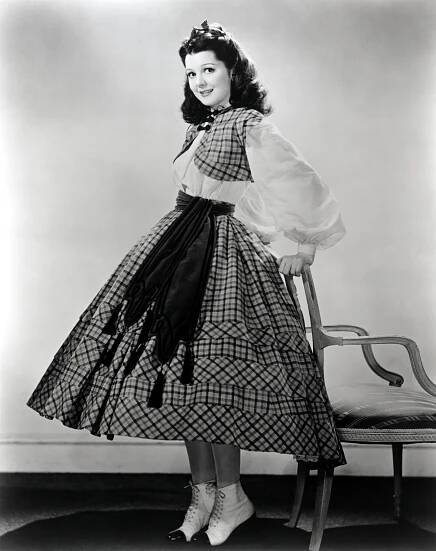 Ann Rutherford in a plaid dress from *Gone With the Wind*.