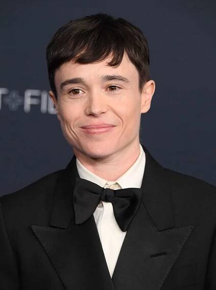 Elliot Page wears a black tuxedo and bowtie