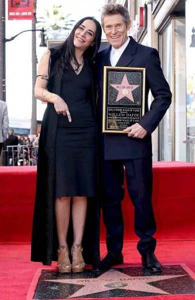 Giada Colagrande and Willem Dafoe attend the Hollywood Walk of Fame Star Ceremony for Willem Dafoe on January 08, 2024 in Hollywood, California.