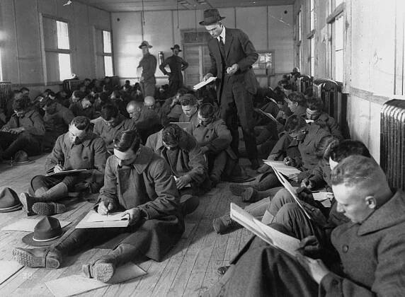 US Army recruits taking an intelligence test at Fort Lee, in Virginia, 1917.