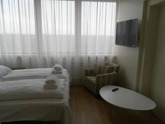 Postel nebo postele na pokoji v ubytování Hotel Madl