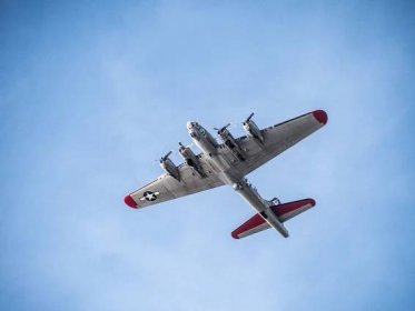 A B-17 Flying Fortress flying in the sky.