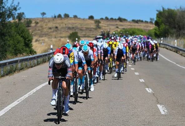 ZARAGOZA, SPAIN - AUGUST 30: Gal Glivar of Slovenia and Team Alpecin - Deceuninck leads the peloton during the La Vuelta - 80th Tour of Spain 2025, Stage 8 a 163.5km stage from Monzon Templario to Zaragoza / #UCIWT / on August 30, 2025 in Zaragoza, Spain. (Photo by Tim de Waele/Getty Images)