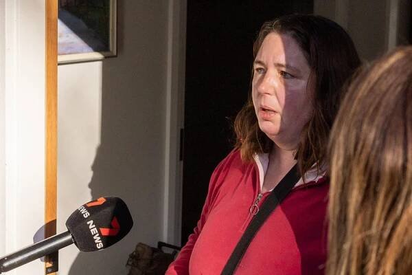Erin Patterson talking to a reporter.