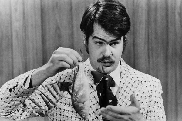 Dan Aykroyd prepares to demonstrate the 'Super Bass-O-Matic' on a sketch from the TV comedy show 'Saturday Night Live