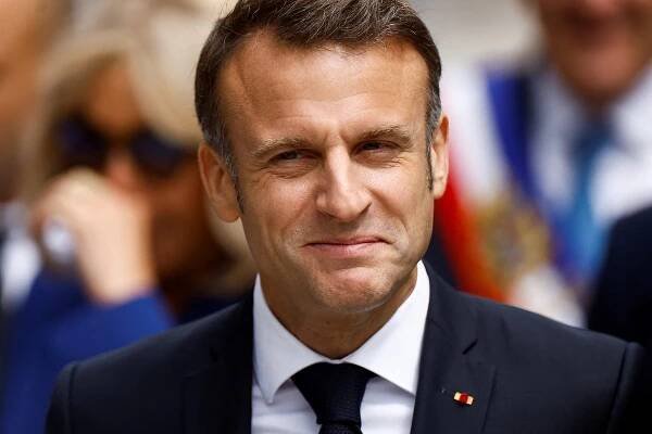 French President Macron votes in the second round of the 2024 snap legislative elections