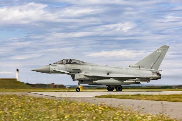 Image shows an RAF Typhoon about to take off.