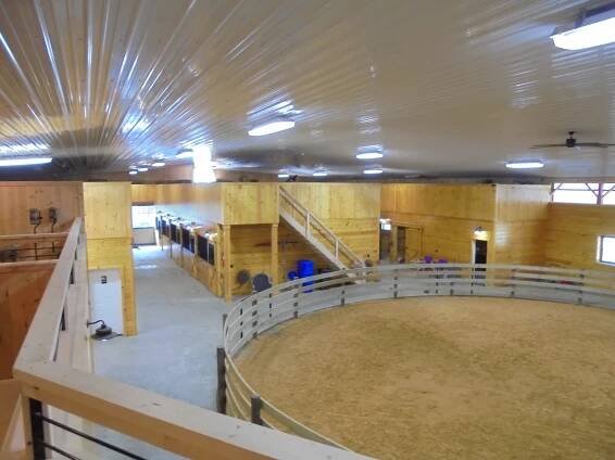 Custom Steel Indoor Arena: Expertly Crafted by Custom Barn Builders | Custom Horse Barns & Equestrian Buildings | Precise