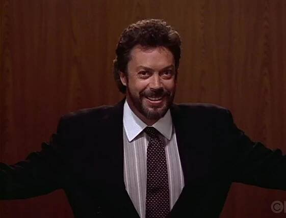 Tim Curry in The Naked Truth (1995)