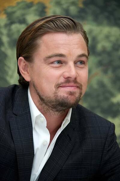 Leonardo DiCaprio with slicked back hair at 'The Wolf Of Wall Street' New York press conference in 2013