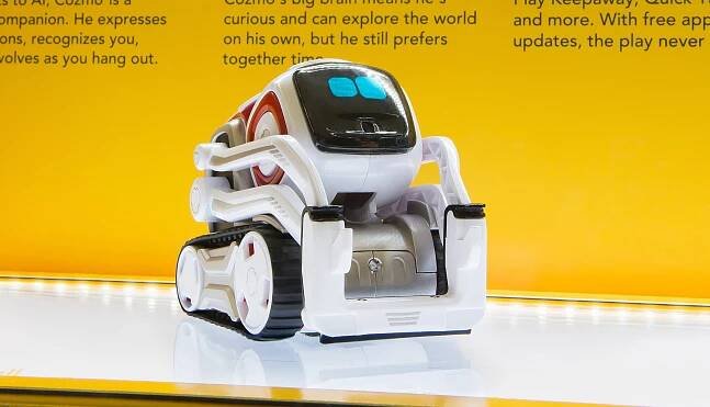 Cozmo the small AI robot on product display with animated face 
