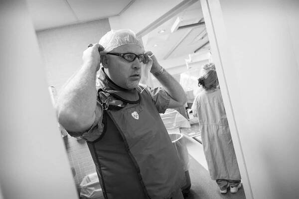 Cardiac surgeon prepping