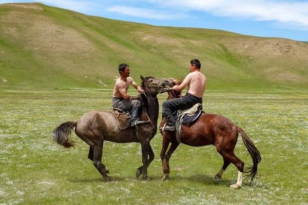 Two men wrestling