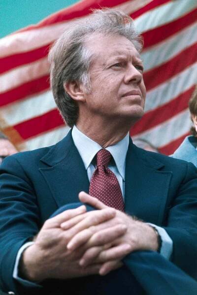 Columbia, S.C.: Democratic candidate Jimmy Carter is in a serious mood as he waits to speak during rally recently in his campaign for the presidency. On the eve of the national elections pollsters across the country are predicting a very tight race between Carter and incumbent Gerald Ford.