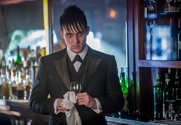 GOTHAM: Oswald Cobblepot (Robin Lord Taylor) observes Maroni's business dealings in the 