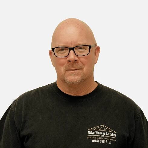 A Mike Walker Lumber team member named John that builds the roof and floor trusses for multi-family homes, residential homes and commercial projects.