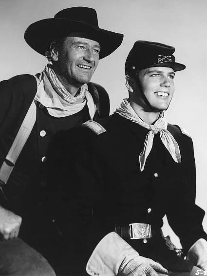 John Wayne and Patrick Wayne in 'The Searchers'.