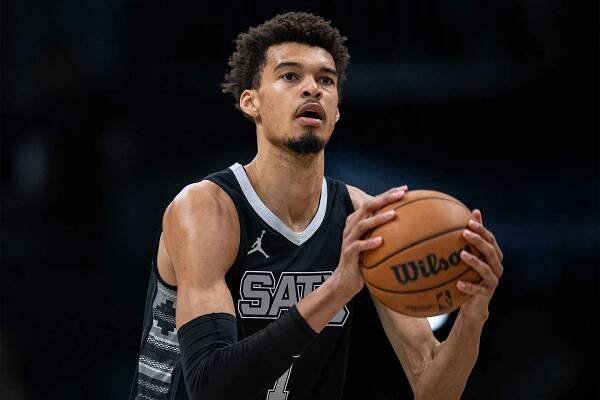 Victor Wembanyama #1 of the San Antonio Spurs plays against the Charlotte Hornets during their game at Spectrum Center on February 07, 2025 in Charlotte, North Carolina. 