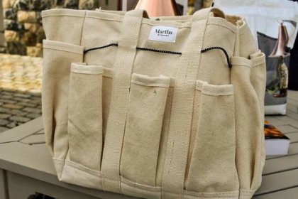 To store all the tools, we offer the Martha Stewart Heavy-Duty Canvas Garden Bag, with 6 Exterior 11-Inch Interior Pockets. Expertly stitched with premium-quality, heavyweight cotton canvas, this spacious bag can safely stash a variety of gardening essentials. It also has reinforced carrying handles and a sturdy shoulder strap - just the right size to tote around the yard, garage, or garden.