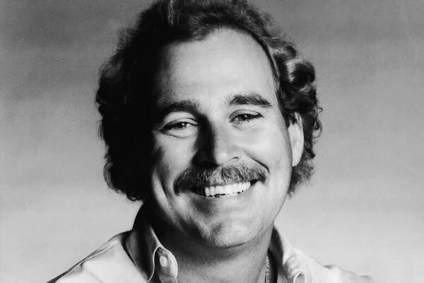 Promotional studio portrait of American singer and songwriter Jimmy Buffett, circa 1983