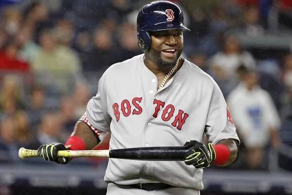 Boston Red Sox designated hitter David Ortiz reacts after flying out in a baseball game against the New York Yankees.