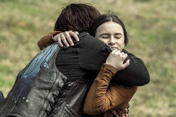 Cailey Fleming as Judith and Norman Reedus as Daryl Dixon in 'The Walking Dead'.