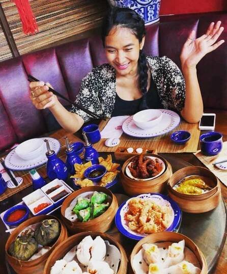 Happy Salma with foods Image
