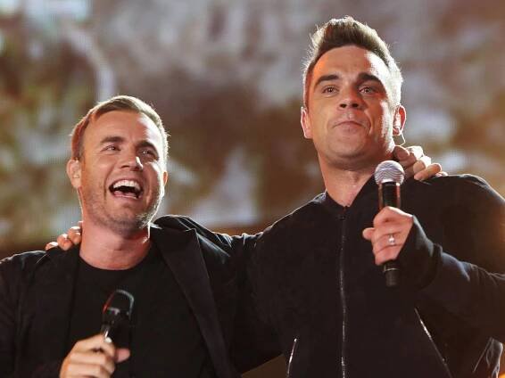 Gary Barlow extends musical olive branch to Robbie Williams after 13 years