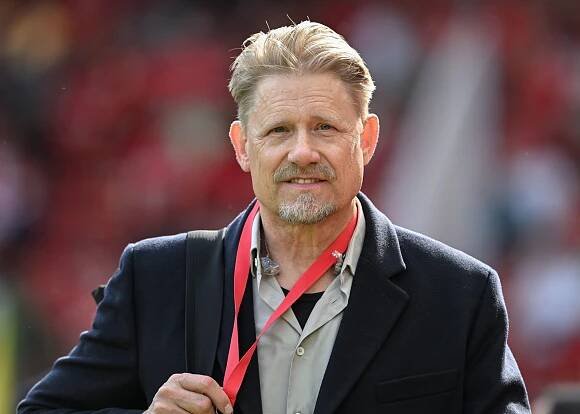 Peter Schmeichel at a Liverpool vs Arsenal match.