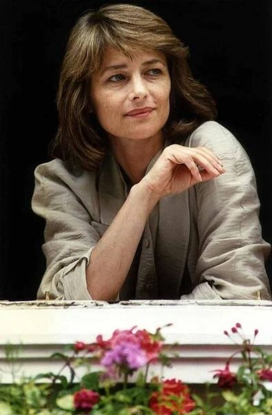 Charlotte Rampling Looking Out Of A Window, 1989.