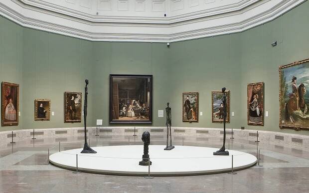 Prado Museum gallery with paintings and sculptures, Madrid.