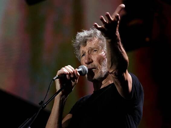 Former member of Pink Floyd, British singer and songwriter Roger Waters performs during his concert of the Us+Them tour in Rome's Circus Maximus, Saturday, July 14, 2018. (AP Photo/Gregorio Borgia)